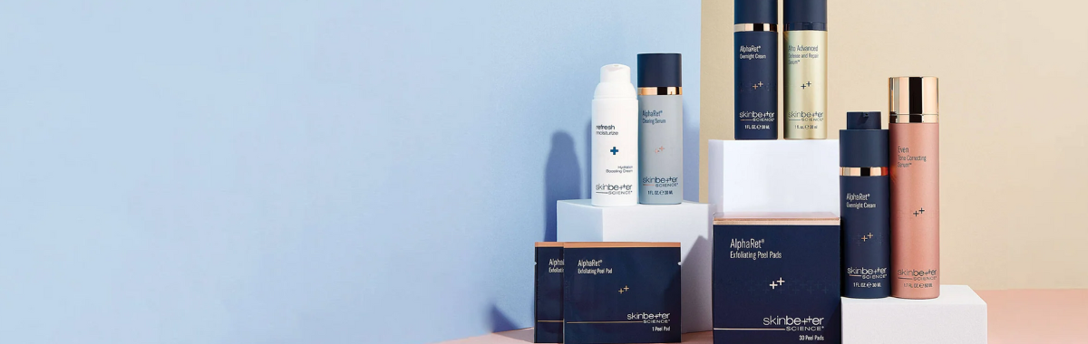 Collection of SkinBetter Science skincare products on a light blue and beige background