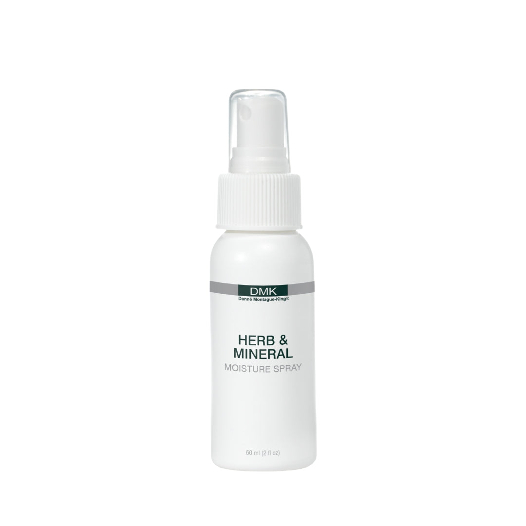 DMK Herb & Mineral Moisture Spray bottle on a white background